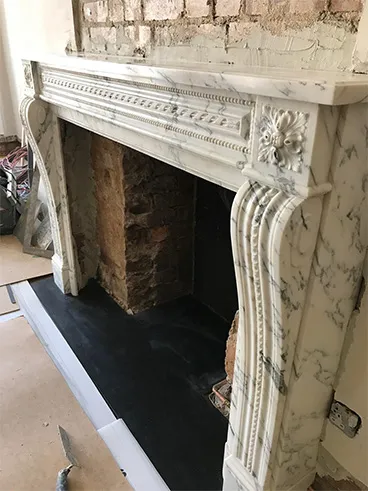 Example of a fireplace worked on by a Stone Mason